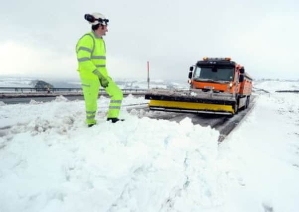 A snow plough clears the A66 near Bowes where the road was closed for several hours