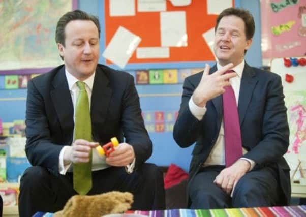 David Cameron and Nick Clegg at Wandsworth Day Nursery in south London