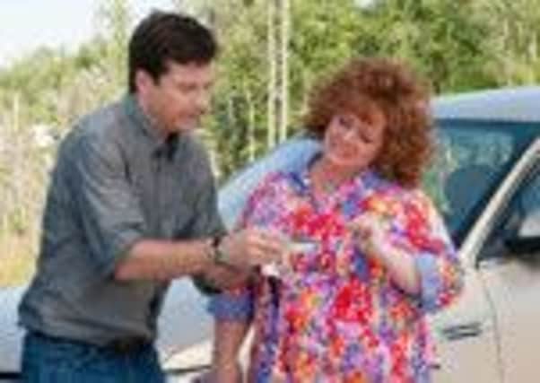 Jason Bateman as Sandy Patterson and Melissa McCarthy as Diana in Identity Thief