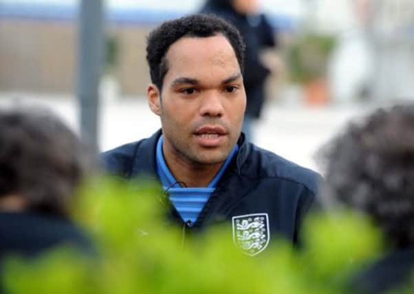 England's Joleon Lescott  gives an interview in Rimini, Italy