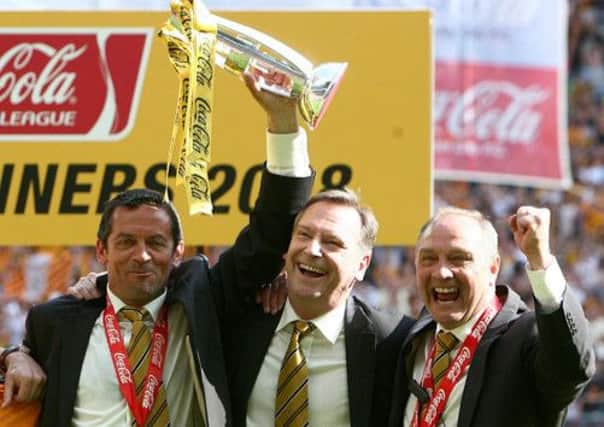Phil Brown celebrates with Paul Duffen, centre, and Brian Horton in 2008.