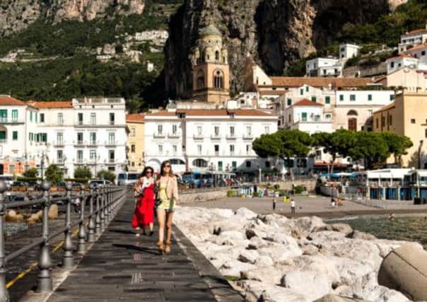 Walking on the pier in Amalfi, Campania, Italy