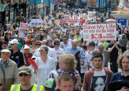 Supporters of the heart unit march through Leeds last summer