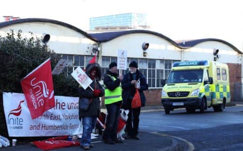 The picket line outside the Leeds offices of the Ambulance Service NHS Trust this morning.