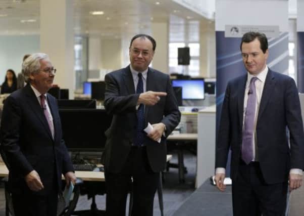 From left: Bank of England Governor Mervyn King, Chief Executive of the Prudential Regulation Authority Andrew Bailey and Chancellor George Osborne, during the opening of the PRA, in London.