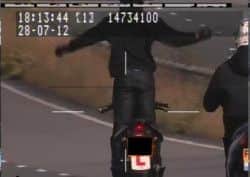 A teenager from Leeds has been disqualified from driving for 15 months after he was filmed riding a motor scooter standing up with his arms outstretched.