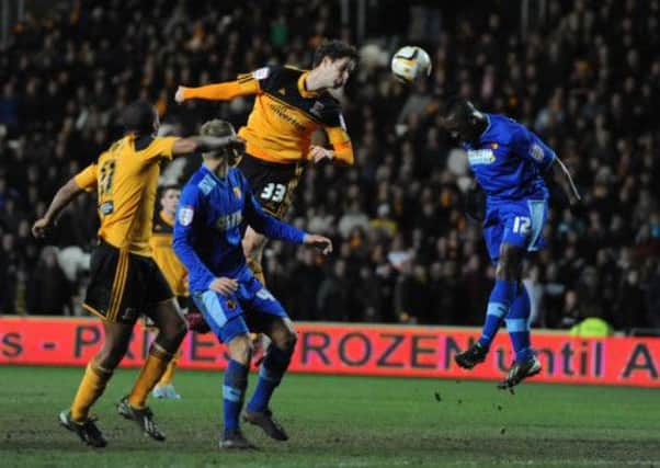 Hull City's Nick Proschwitz heads the ball towards the goal