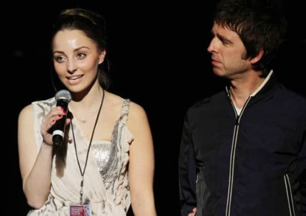 Noel Gallagher with Charlotte Newman (also below).