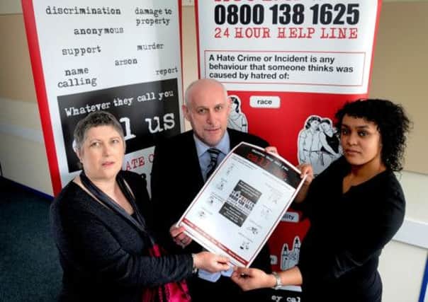 Stop Hate Crime staff,  Rose Simkins (Chief Executive), Andrew Bolland (Business Manager) and Una Morris (Project Manager) and Stephen Lawrence pictured below.