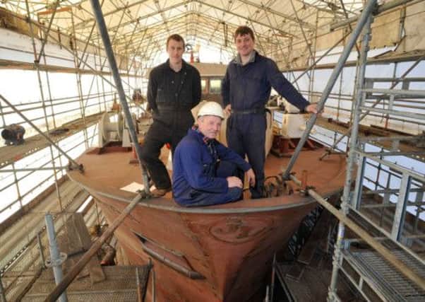 Jim Morrison with James Morrison and and Edward Oliver on board the trawler "Our Lass III " at  Parkol Marine shipbuilders in Whitby. Picture: Tony Bartholomew