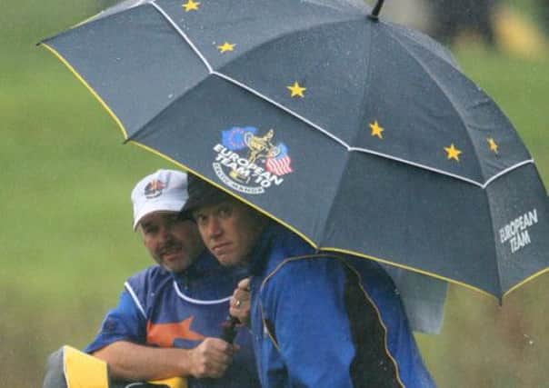 Billy Foster (left) with his old employer Lee Westwood. (Picture: Lynne Cameron/PA Wire).