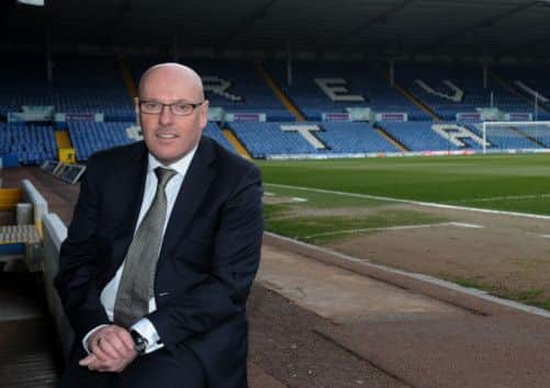 New Leeds United manager Brian McDermott poses for photographs