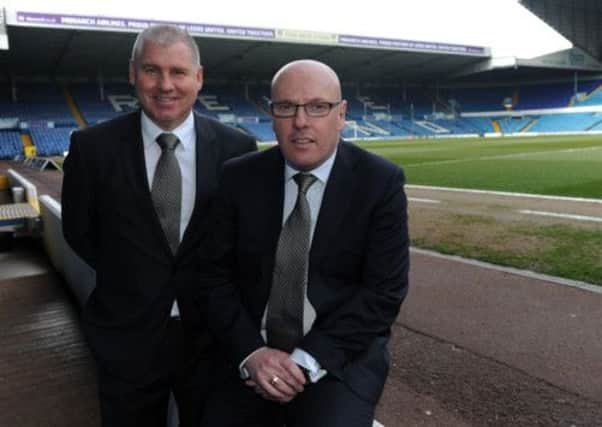 Leeds United manager Brian McDermott (right) and assistant Nigel Gibbs
