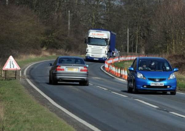 Vehicles travel along the A18 at Laceby near Grimsby