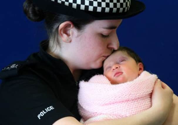 Pc Charlotte Work holds baby Charlotte at Edinburgh Royal Infirmary