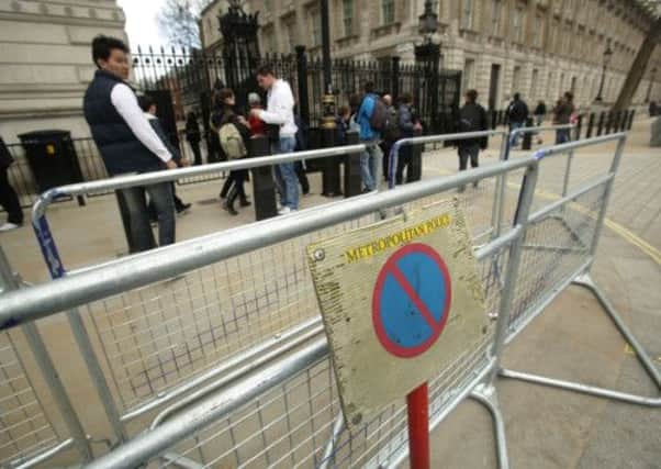 A double layer of security barriers are put down outside Downing Street