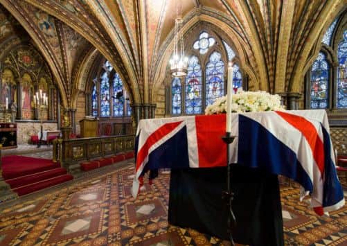 The coffin of Baroness Thatcher rests in the Crypt Chapel of St Mary Undercroft beneath the Houses of Parliament