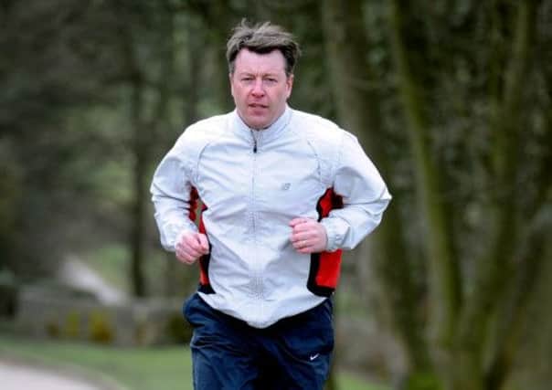 Martin Lambert is running the London Marathon despite two near death illnesses