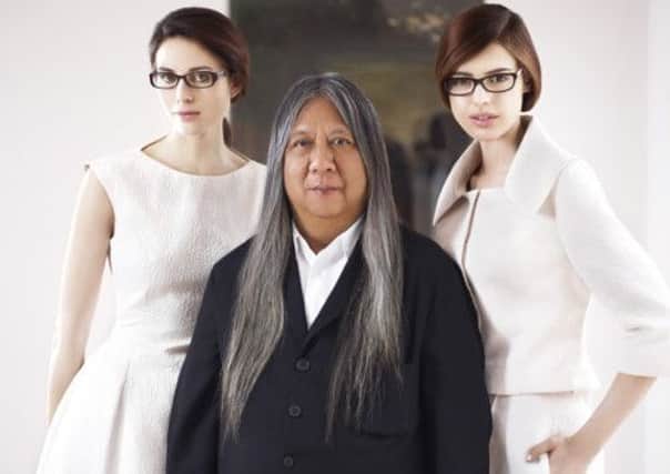 John Rocha with models wearing his new collection for Specsavers.