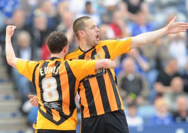 Matty Fryatt, Corry Evans and Hull hope to clinch promotion.