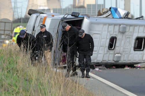 The scene of a road traffic accident on the westbound carriage of the M62 near Pontefract in West Yorkshire between a lorry and a mini bus carrying around 20 women.
