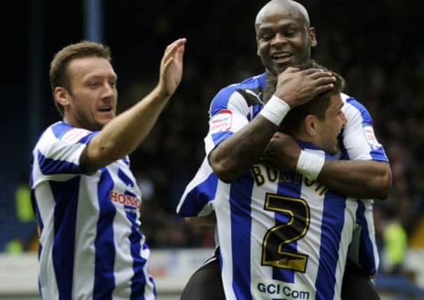 Sheffield Wednesday's Leroy Lita celebrates the second goal with Lewis Buxton and Steve Howard