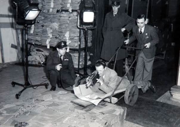 Charles Wood (back, centre) working on the day night fliters for the Dambusters