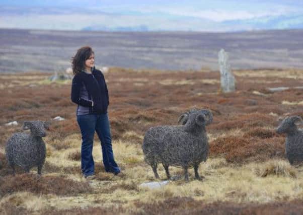 Emma Stothard with her Swaledale sheep sculptures