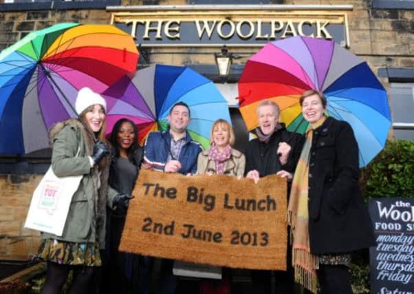Members of Chapel Allerton community group cara, Alison Ford, Cordelia Oyekan-John, Matt Tamplin, Cliff Hughes and Hannah Howe join Vanessa White, centre, from the Big Lottery Fund to launch The Big Lunch at The Woolpack Pub in Esholt made famous by Emmerdale.  Below: Sir Tim Smit welcomes Royal visitors to the Eden Project.