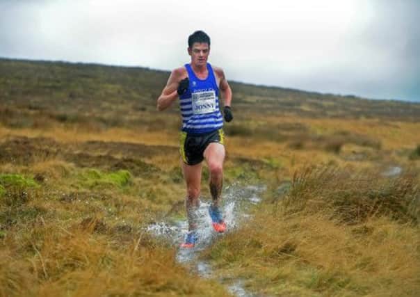 Jonny Brownlee leads the field out on his way to winning the 'Auld Lang Syne' fell race From Penistone Hill Country Park on new Year's Eve. His 2013 starts belatedly in Yokohama this weekend. (
Picture: Bruce Rollinson)