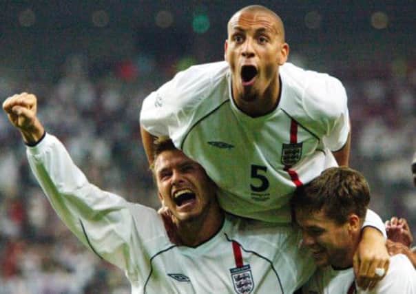 David Beckham,, Rio Ferdinand and Michael Owen for England in 2002