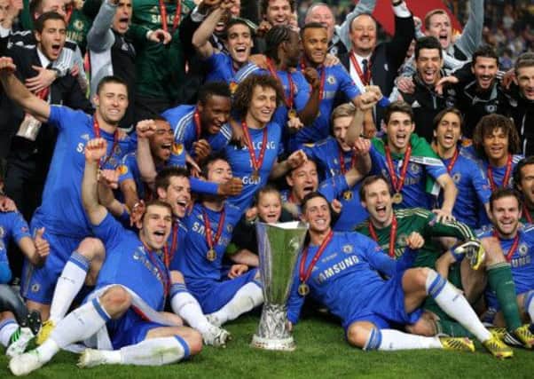 Chelsea players celebrates with the UEFA Europa League trophy