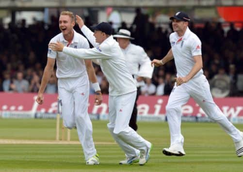 England's Stuart Broad celebrates taking the wicket of New Zealand's Ross Taylor for 0 during the first test at Lord's Cricket Ground, London
