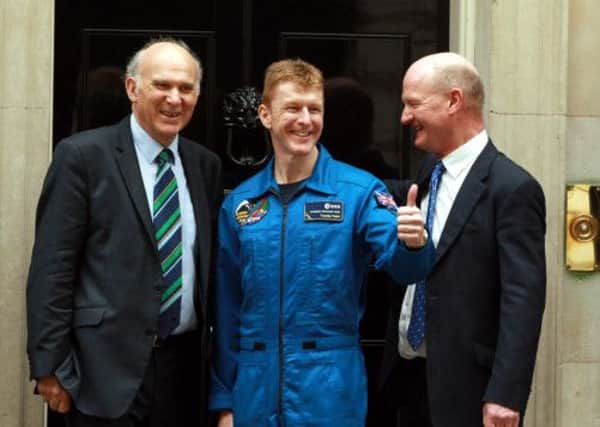 British Astronaut Tim Peake (centre) with Vince Cable (left) and Science Minister David Willetts at Downing Street.
