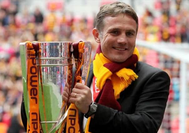 Phil Parkinson with the npower Football League Two Play Off trophy