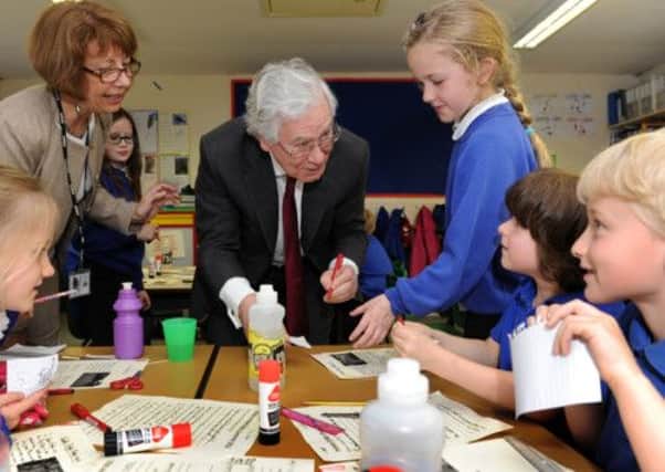 Mervyn King signing autographs for pupils at his old school, Old Town Primary School, Wadsworth, above Hebden Bridge
