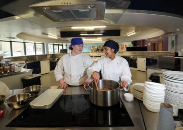 Chef Sophie Hutton with Kainaat Rashid, 15. Picture by Simon Hulme