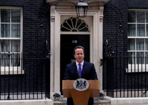 Prime Minister David Cameron makes a statement in Downing Street today as anti-terror police were preparing to question the two men shot and injured after the Woolwich soldier killing