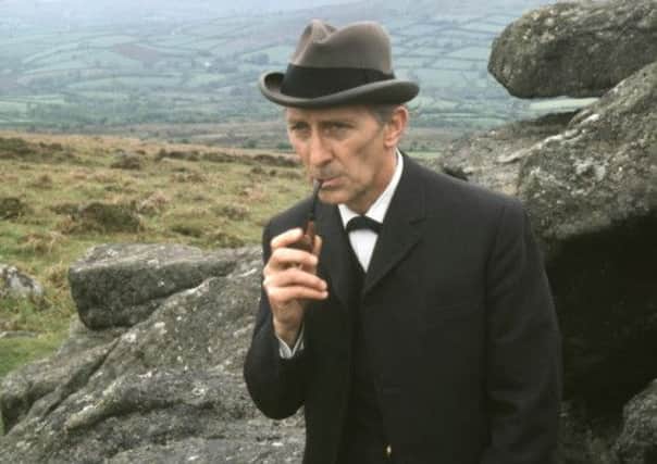 Peter Cushing as Sherlock Holmes in The Hound of the Baskervilles (1968)