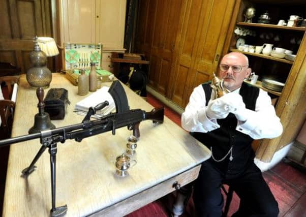 Mr Parsons the butler prepares for the 1940's event at Brodsworth Hall near Doncaster