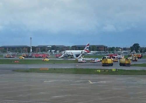 A British Airways plane surrounded by emergency vehicles after it had to make an emergency landing at Heathrow