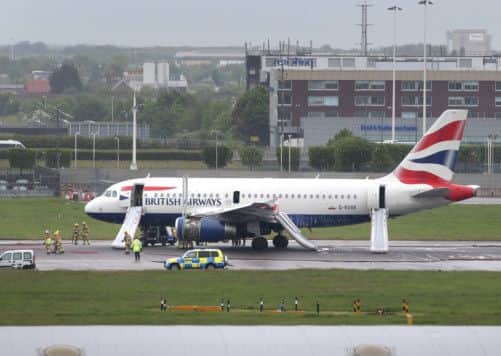 A British Airways plane surrounded by emergency vehicles after it had to make an emergency landing at Heathrow