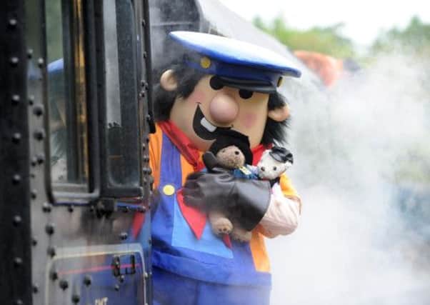 NYMR mascot Tracker Jack with his tedy bears on the footplate of locomotive 45407. Picture by Gerard Binks