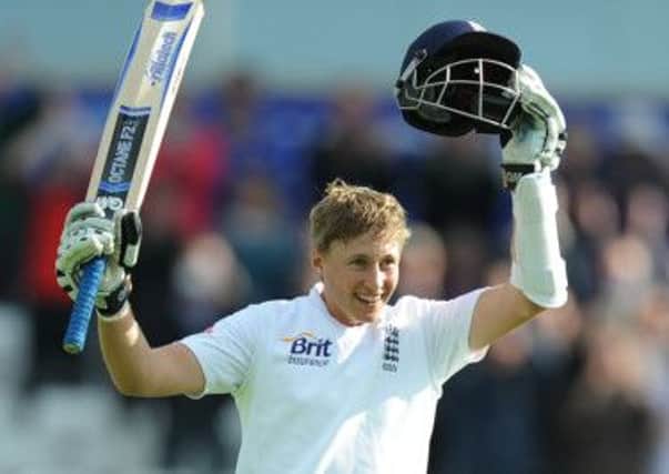 England's Joe Root celebrates his 100 during the Second Investec Test match at Headingley, Leeds.