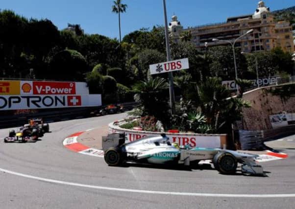 Mercedes driver Nico Rosberg of Germany, leads Red Bull driver Sebastian Vettel of Germany, and Red Bull driver Mark Webber of Australia, during the Monaco F1 Grand Prix. (Picture: AP Photo/Claude Paris)