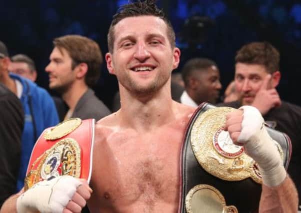 Carl Froch poses after the IBF Super Middleweight Championship bout at the O2 Arena, London.