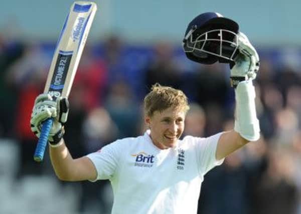 England's Joe Root celebrates his 100 during the Second Investec Test match at Headingley, Leeds