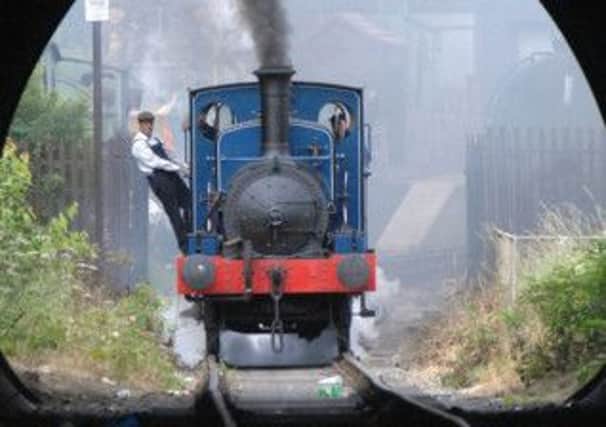 A steam engines goes through the tunnel on the Middleton line in Leeds