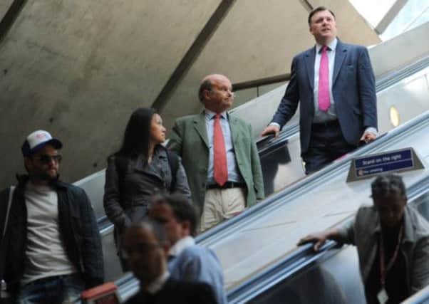 Shadow Chancellor Ed Balls leaves Canary Wharf in London