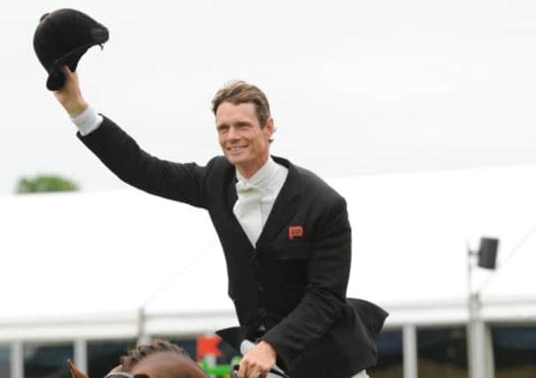 William Fox-Pitt celebrates being overall winners during the Bramham International Horse Trials